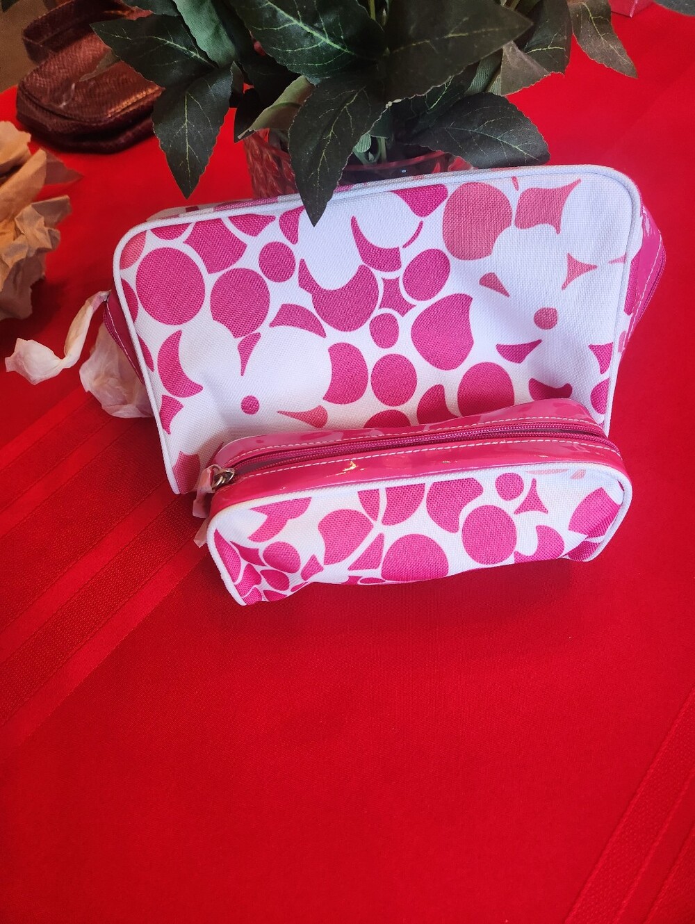 Clinique Pink and White Patterned Cosmetic Bags